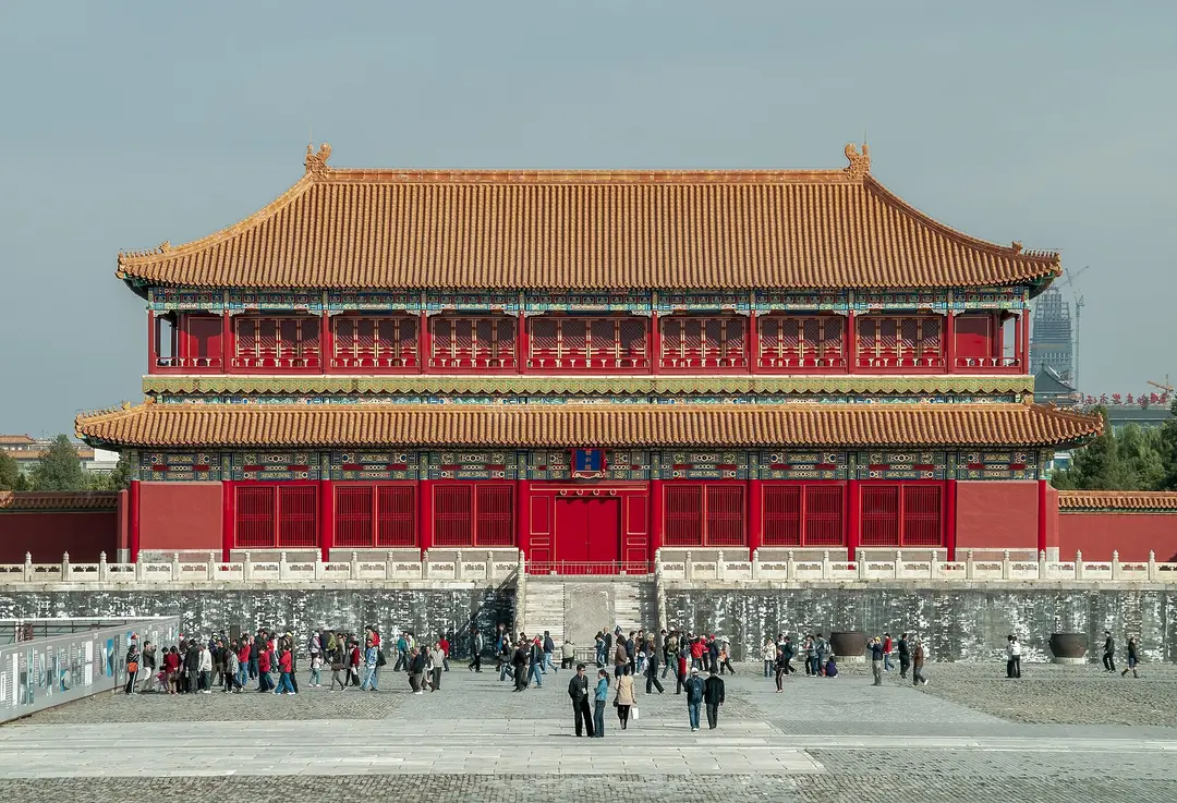 Two-story red hall with a yellow tiled roof on a white marble terrace inside the Forbidden City