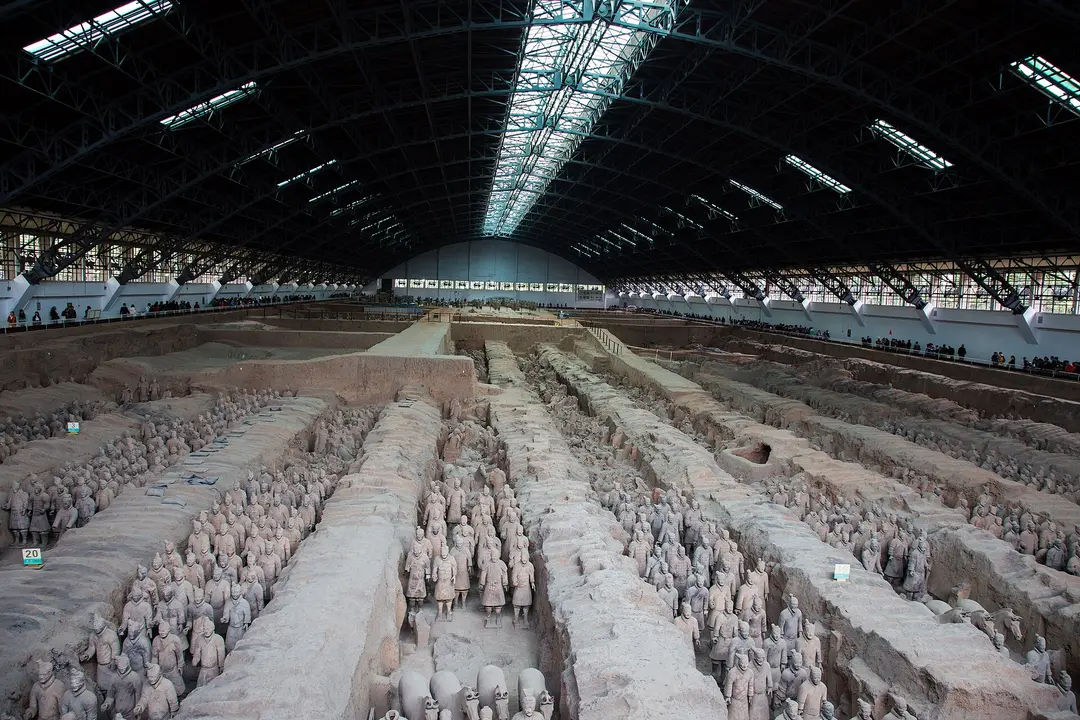 Rows of terracotta soldiers in the earth corridors of Pit 1 under the arched hall roof