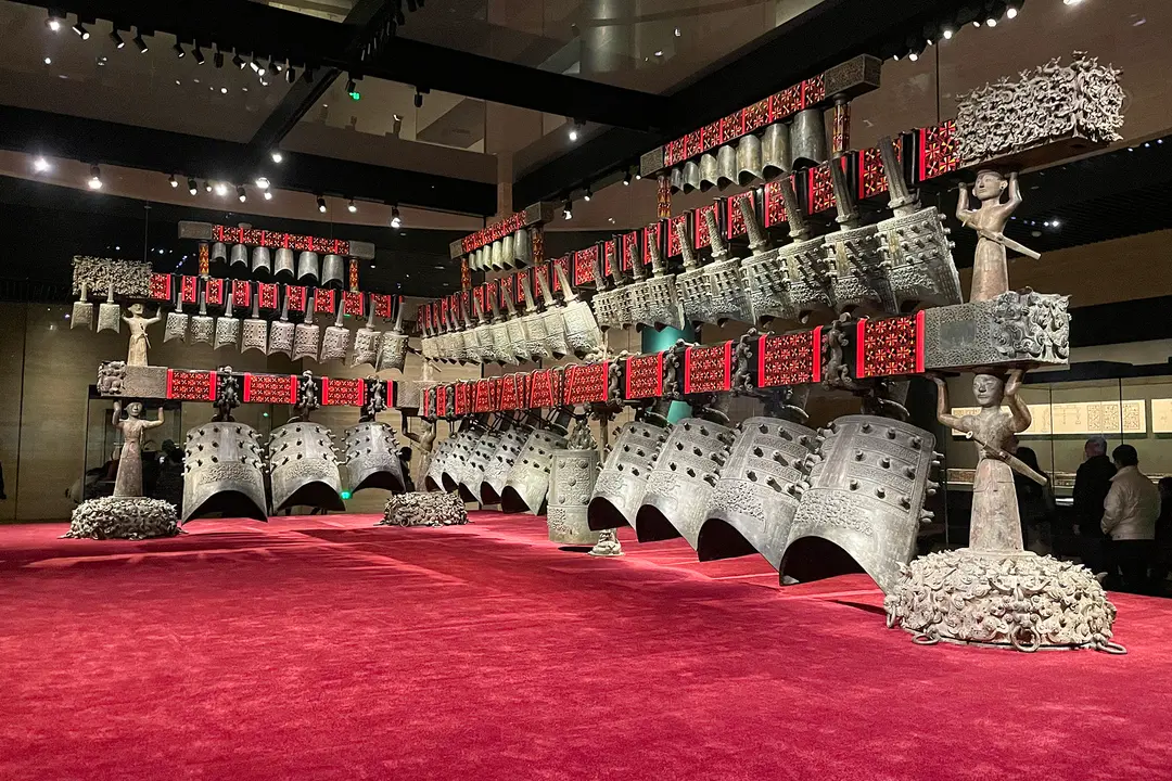 The bronze chime bells of Marquis Yi of Zeng hanging in rows on their frame in the Hubei Provincial Museum